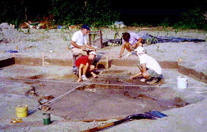 Under the directon of David Phelps, East Carolina University students map the locations of artifacts at the Nooherooka site in Greene County, N.C. Image from the North Carolina Highway Historical Marker Program. 