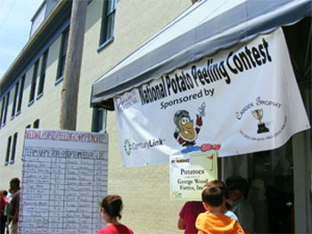 Photograph of the National Potato Peeling Contest at the Elizabeth City Irish Potato Festival.  By Ajsanjua CC BY-SA 3.0, from Wikimedia Commons.