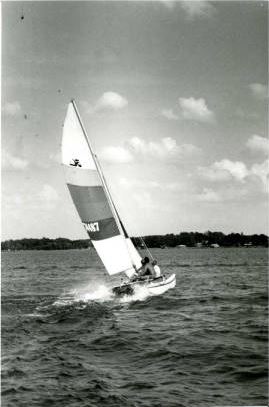 Visitors on sailboat, Lake Norman, photograph 1987 by Linda Sluder.  North Carolina State Parks Collection, North Carolina Digital Collections. Prior permission from the North Carolina Division of State Parks is required for any commercial use. 